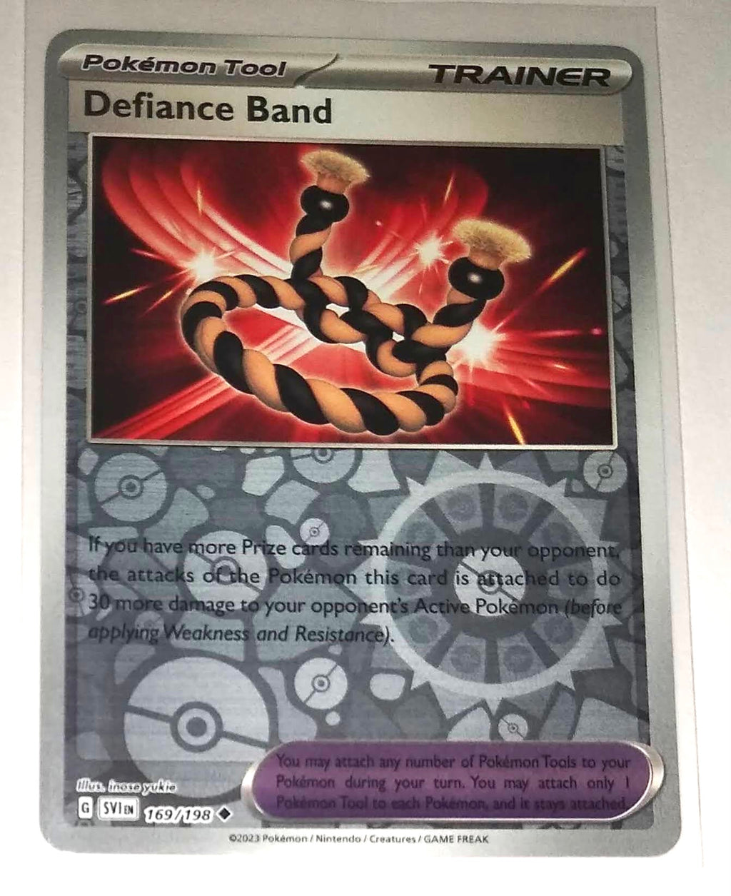 English Pokemon Scarlet & Violet SV1EN 169/198 Defiance Band Reverse Holo